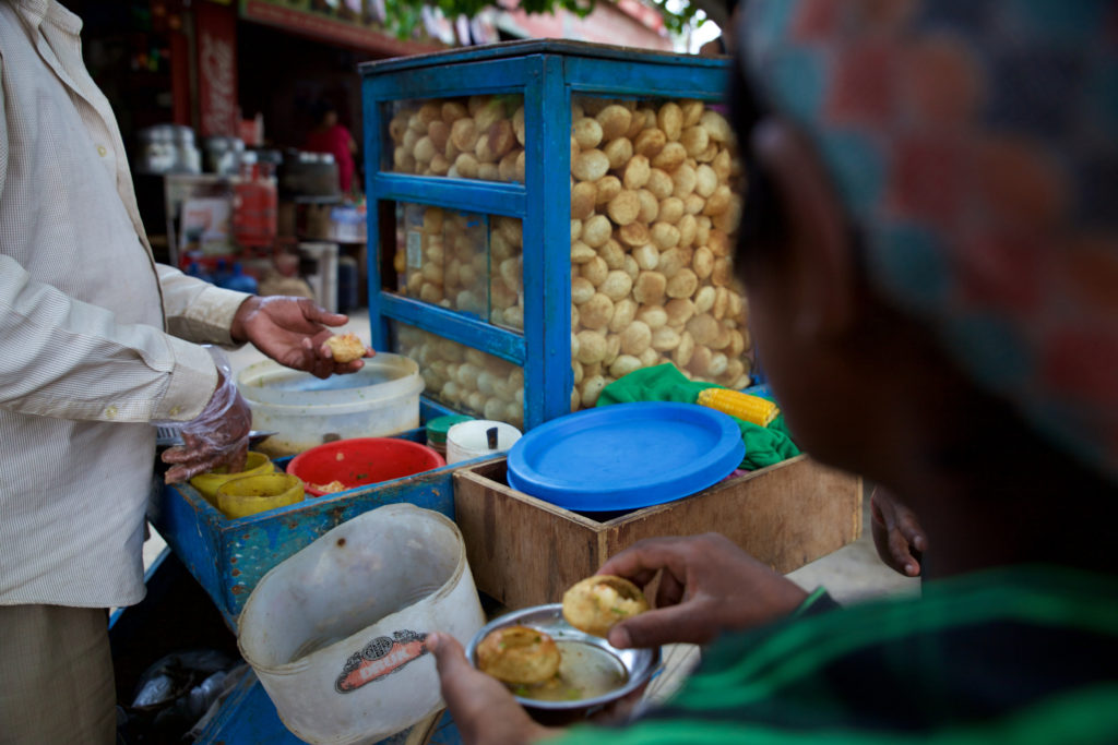 This is how Pani puri is sold on the street. Kishore fell ill the day after he ate Pani puri and chat pat. This may be a cause of his illness.