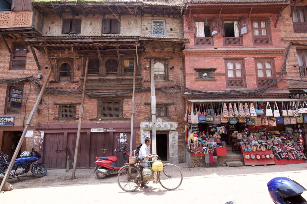 Suzen’s house was badly damaged by the earthquake on April 25, 2015. His family continues to live on the first floor of the house which is supported by big wooden rods to prevent it from falling, in case of another tremor. Photo Credit: Mithila Jariwala