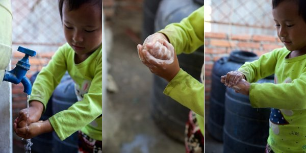 Rasmina demonstrates how she now washes her hands with soap after recovering from typhoid.