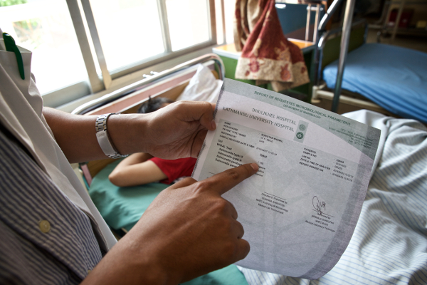 Dr. Shrestha points out a positive Widal test result. The Widal is a serological test that is considered inaccurate, leading Dr. Shrestha to diagnose typhoid based mainly on his clinical judgement.
