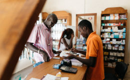 People purchase medication at the Pharmacie Bakh Yaye in Thies, Senegal. PATH
