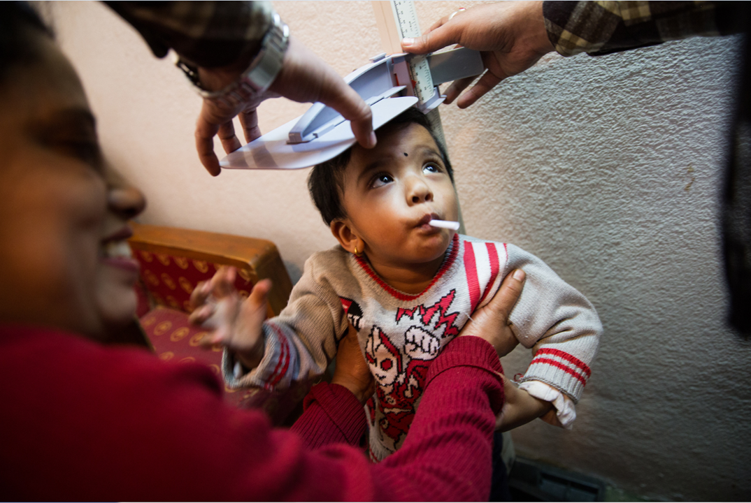 After enrolling in the study, children receive a general examination to ensure they are fit for vaccination. For children under five, trial staff make sure to measure their height and weight.