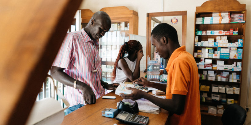 People purchase medication at the Pharmacie Bakh Yaye in Thies, Senegal. PATH