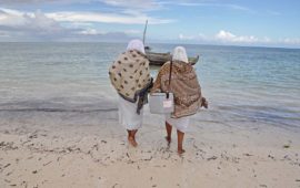 Health care workers delivering vaccines in Tanzania