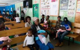 Angela Godfrey, age 26, and her daughter Sara Kambua, age 5, wait in the health clinic in Mukuru, Kenya, February 5, 2018.