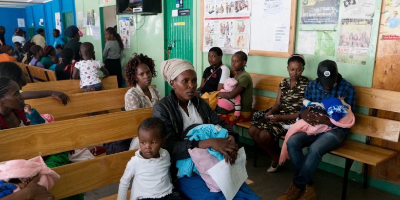 Angela Godfrey, age 26, and her daughter Sara Kambua, age 5, wait in the health clinic in Mukuru, Kenya, February 5, 2018.