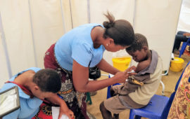 Health care worker administers TCV to a boy as part of the TCV trial in Malawi