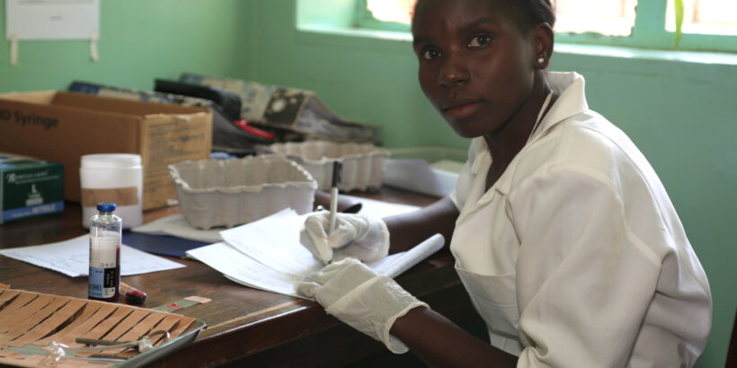 Nurse in Malawi works in lab. STRATAA