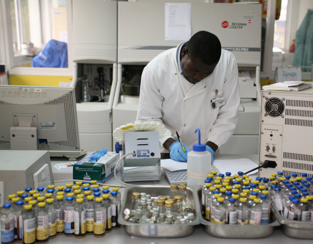 Lab worker in Malawi_STRATAA