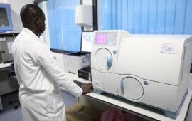 A photo showing a laboratory technician