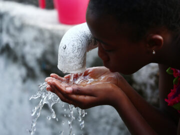 A child drinking water in Liberia