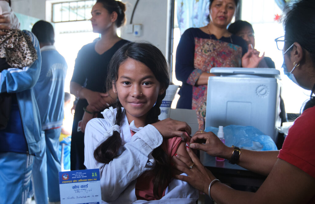 Administering TCV during Nepal’s introduction of the vaccine in 2022.