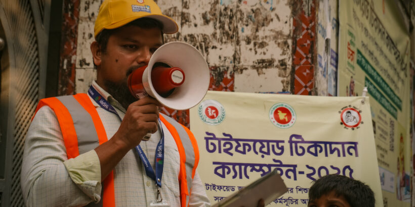 An immunization campaign worker spreading the word about TCV during Bangladesh’s TCV introduction in 2025.