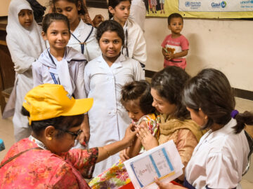 Children line up to receive TCV during Bangladesh’s TCV introduction campaign.