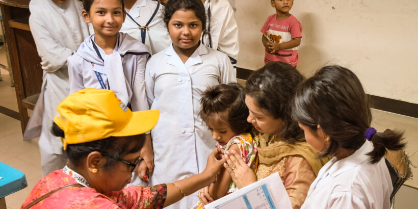 Children line up to receive TCV during Bangladesh’s TCV introduction campaign.