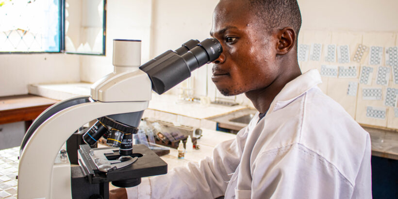 Mukizi Kabela-Kondo, a laboratory technician at Kenge General Hospital in the Democratic Republic of the Congo, performs the Widal test, which detects the presence of antibodies against Salmonella typhi, the bacteria causing typhoid.