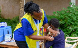 A health care worker delivers typhoid conjugate vaccine during Kenya's TCV introduction campaign.