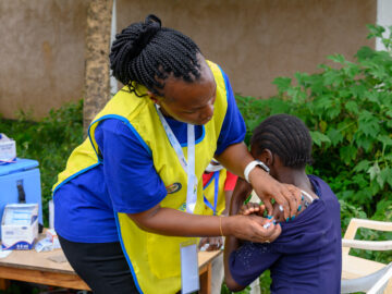 A health care worker delivers typhoid conjugate vaccine during Kenya's TCV introduction campaign.