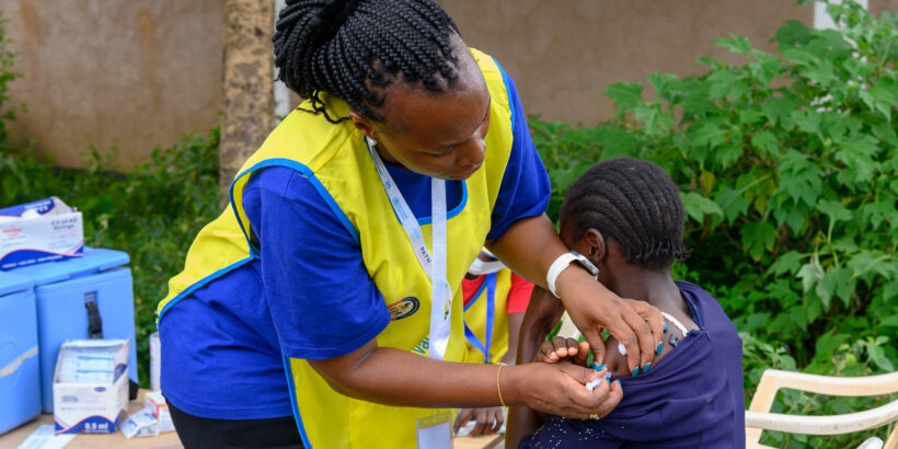 A health care worker delivers typhoid conjugate vaccine during Kenya's TCV introduction campaign.